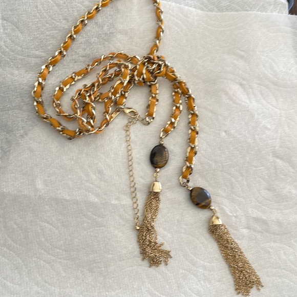 White House Black Market Jewelry - Necklace white house black market. Made by leather color gold